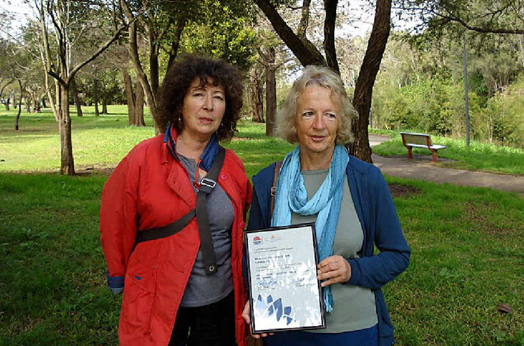 From left, Wilson Creek Huonbrook Landcare secretary Julie Gardner and president Barbara Stewart hold the certificate announcing the grant. From left, Wilson Creek Huonbrook Landcare secretary Julie Gardner and president Barbara Stewart hold the certificate announcing the grant.